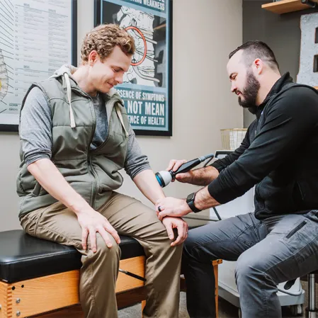 Chiropractor Boone NC Mark Torrie With Stemwave Patient